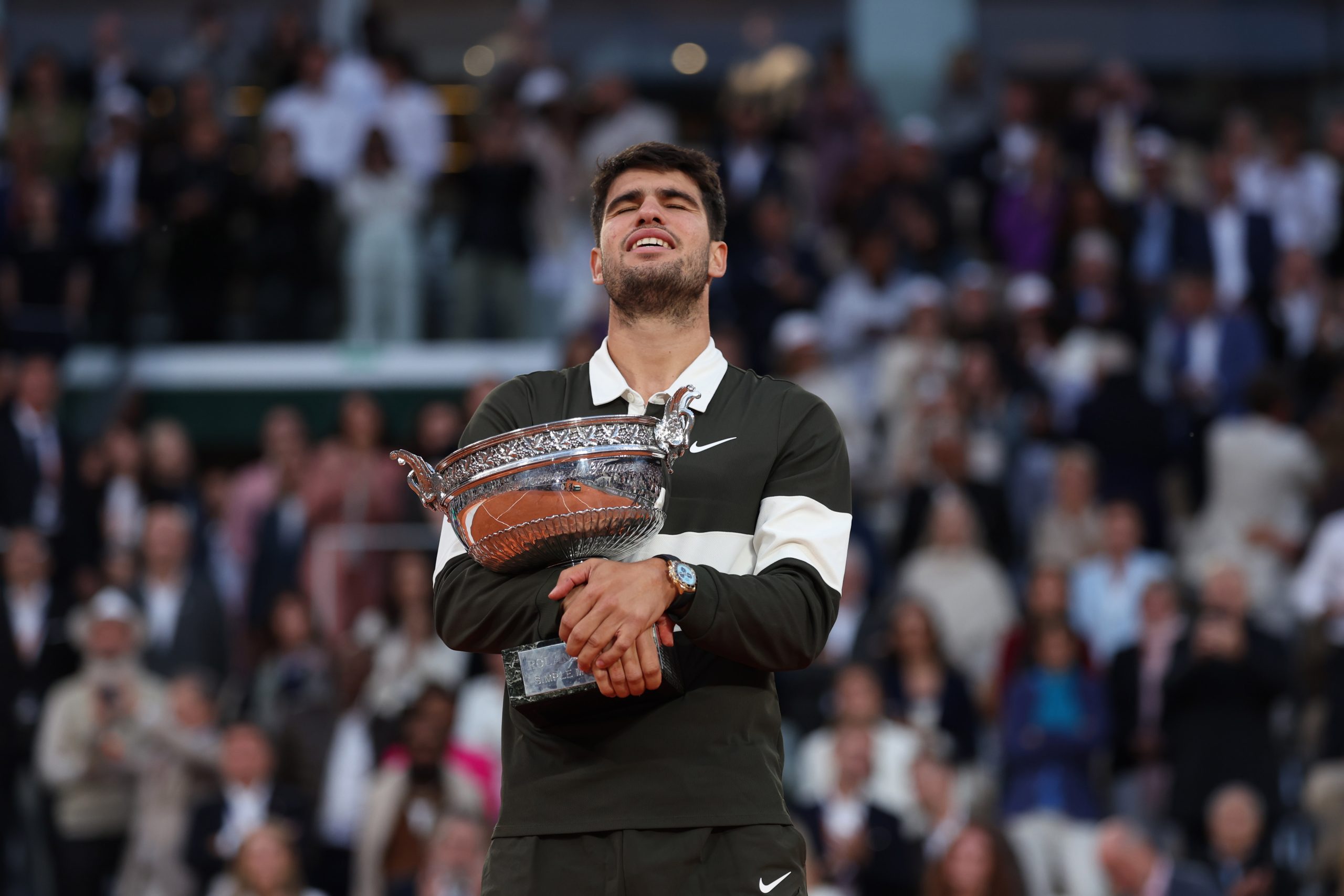 Prizegicing ceremony with Carlos Alcaraz (Spa) holding the trophy after his final round men's singles match against Jannik Sinner (Ita) on day fifteen at Roland-Garros 2025 ROLEX